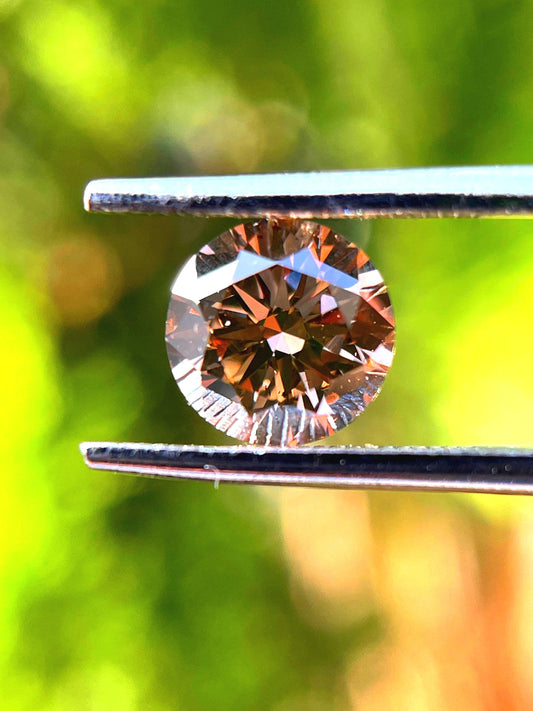 Sold this diamond...1.01ct Fancy cognac Brown Colour : Round Brilliant Cut (6.53x3.93mm) Diamond